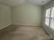 Spacious bedroom with high ceilings and window at 9237 Bellegarde Dr, Charlotte, NC 28277