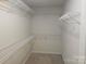 Walk-in closet with wire shelving at 9237 Bellegarde Dr, Charlotte, NC 28277