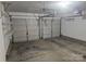 Spacious two car garage with storage racks at 9237 Bellegarde Dr, Charlotte, NC 28277