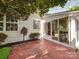Private backyard brick patio is perfect for outdoor entertaining, has easy access to a sunroom at 9360 Meadowmont View Dr, Charlotte, NC 28269