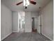 Large bedroom featuring neutral walls, carpet flooring and a ceiling fan with light fixture at 9360 Meadowmont View Dr, Charlotte, NC 28269