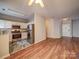 Open concept kitchen with stainless steel appliances and modern white cabinetry at 9360 Meadowmont View Dr, Charlotte, NC 28269