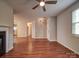 Spacious living area with hardwood floors, natural light, and an open floor plan, ideal for modern living at 9360 Meadowmont View Dr, Charlotte, NC 28269