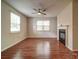Inviting living room featuring a cozy fireplace and open layout, perfect for relaxing and entertaining guests at 9360 Meadowmont View Dr, Charlotte, NC 28269