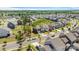 An aerial view of a neighborhood with tree-lined streets and well-manicured lawns at 1001 Linn Cv, Waxhaw, NC 28173