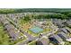 Aerial view of the community featuring tennis courts, playground and well-manicured landscaping at 1001 Linn Cv, Waxhaw, NC 28173