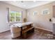 Cozy dining area featuring natural light, modern decor and views from a large window at 1001 Linn Cv, Waxhaw, NC 28173