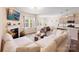 Modern kitchen featuring stainless steel appliances, a spacious island, and stylish pendant lighting at 1001 Linn Cv, Waxhaw, NC 28173