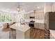 Well-appointed kitchen with an island, stainless steel appliances, and ample cabinet space at 1001 Linn Cv, Waxhaw, NC 28173