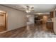 Open floor plan living room with vinyl floors seamlessly connects to the kitchen at 105 Peridot Dr, Statesville, NC 28625