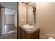 Vanity with countertop, mirror, and wood cabinets for ample storage space at 105 Peridot Dr, Statesville, NC 28625