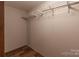 Spacious walk-in closet with metal shelving, offering ample storage space at 105 Peridot Dr, Statesville, NC 28625