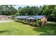 Charming brick home with a well-maintained front yard, lush green grass, and manicured shrubs at 1094 Curve View Rd, Lincolnton, NC 28092