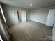 Bedroom with carpeted floors at 110 Browband St, Troutman, NC 28166