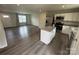 Modern kitchen with stainless steel appliances, granite countertops, and an open island layout at 110 Browband St, Troutman, NC 28166