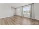 Spacious living room with hardwood floors, staircase and natural light at 110 Browband St, Troutman, NC 28166