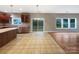 Open-concept kitchen and dining area with stainless steel appliances and sliding glass doors at 110 Colville Rd, Mooresville, NC 28117