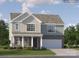Charming two-story home with stone accents, attached two-car garage, and well-manicured lawn at 1102 Old Trade St, Edgemoor, SC 29712