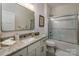 Bathroom with granite countertop vanity, framed mirror and a shower-tub combination at 1109 Bunch Dr, Statesville, NC 28677