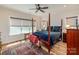 Bedroom with wood floors, ceiling fan, and natural light at 1109 Bunch Dr, Statesville, NC 28677