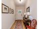 Bright hallway features hardwood floors and tasteful decor at 1109 Bunch Dr, Statesville, NC 28677