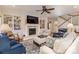 Cozy living room with built-in bookshelves, a fireplace, and comfortable seating at 1109 Bunch Dr, Statesville, NC 28677