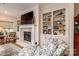 Living room with fireplace, built-in shelving, and comfortable seating at 1109 Bunch Dr, Statesville, NC 28677