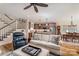 Open-concept living space with a modern kitchen, dining area, and cozy seating at 1109 Bunch Dr, Statesville, NC 28677