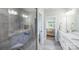 Bathroom with tiled walk-in shower and double vanity, view into main bedroom at 122 A Deer Brook Dr # A, Shelby, NC 28150