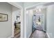 Elegant entryway with hardwood floors, chandelier, and open view to bedroom and front yard at 122 A Deer Brook Dr # A, Shelby, NC 28150