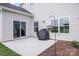 Back patio with sliding glass doors and a covered grill at 122 A Deer Brook Dr # A, Shelby, NC 28150