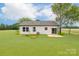 Expansive backyard featuring a well-maintained lawn and patio area, perfect for outdoor entertaining at 1244 Bob Falls Rd, Shelby, NC 28150