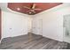Large bright bedroom with hardwood style floors, with multiple doors at 1244 Bob Falls Rd, Shelby, NC 28150