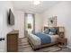 Cozy bedroom with neutral tones, a plush rug, and view to the outside at 1244 Bob Falls Rd, Shelby, NC 28150