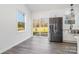 Modern kitchen with stainless steel appliances and a sliding glass door to the outside at 1244 Bob Falls Rd, Shelby, NC 28150