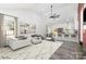 A bright and open living room featuring vaulted ceilings and modern decor, seamlessly connected to the kitchen area at 1244 Bob Falls Rd, Shelby, NC 28150