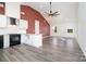 Open living space with modern kitchen, an island and vaulted ceilings at 1244 Bob Falls Rd, Shelby, NC 28150