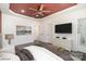 Spacious main bedroom with modern decor, TV, and ensuite bathroom entrance at 1244 Bob Falls Rd, Shelby, NC 28150