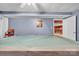 Basement recreational area features a pool table and a glimpse of a fireplace at 129 Renaissance Pl, Statesville, NC 28625