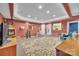 Basement recreational space features a fireplace, seating area, and access to other rooms at 129 Renaissance Pl, Statesville, NC 28625