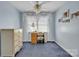 Bright bedroom with blue carpet and a window featuring sheer white curtains at 129 Renaissance Pl, Statesville, NC 28625