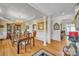 Well-lit dining room featuring a decorative chandelier, beautiful wood table, and chair set at 129 Renaissance Pl, Statesville, NC 28625
