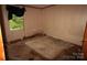 This bedroom shows a window and worn carpet at 1320 Smith Woods Dr, Hickory Grove, SC 29717