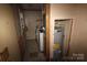 This laundry room has a water heater and a washing machine at 1320 Smith Woods Dr, Hickory Grove, SC 29717