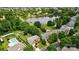 Beautiful neighborhood featuring a tranquil lake and well-maintained homes with a community pool at 138 Montibello Dr, Mooresville, NC 28117