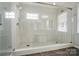 Luxurious shower room with dual showerheads and a built-in bench at 138 Montibello Dr, Mooresville, NC 28117