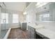 Modern bathroom with double sink vanity, grey cabinets, and a glass enclosed shower at 138 Montibello Dr, Mooresville, NC 28117