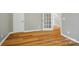 Second-floor bedroom with hardwood floors, and two white doors at 138 Montibello Dr, Mooresville, NC 28117