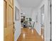 Inviting home entryway with gleaming hardwood floors and a view into the spacious living area at 144 Sea Trail Dr, Mooresville, NC 28117