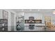 Bright modern kitchen with stainless appliances, granite countertops, and white cabinetry at 144 Sea Trail Dr, Mooresville, NC 28117